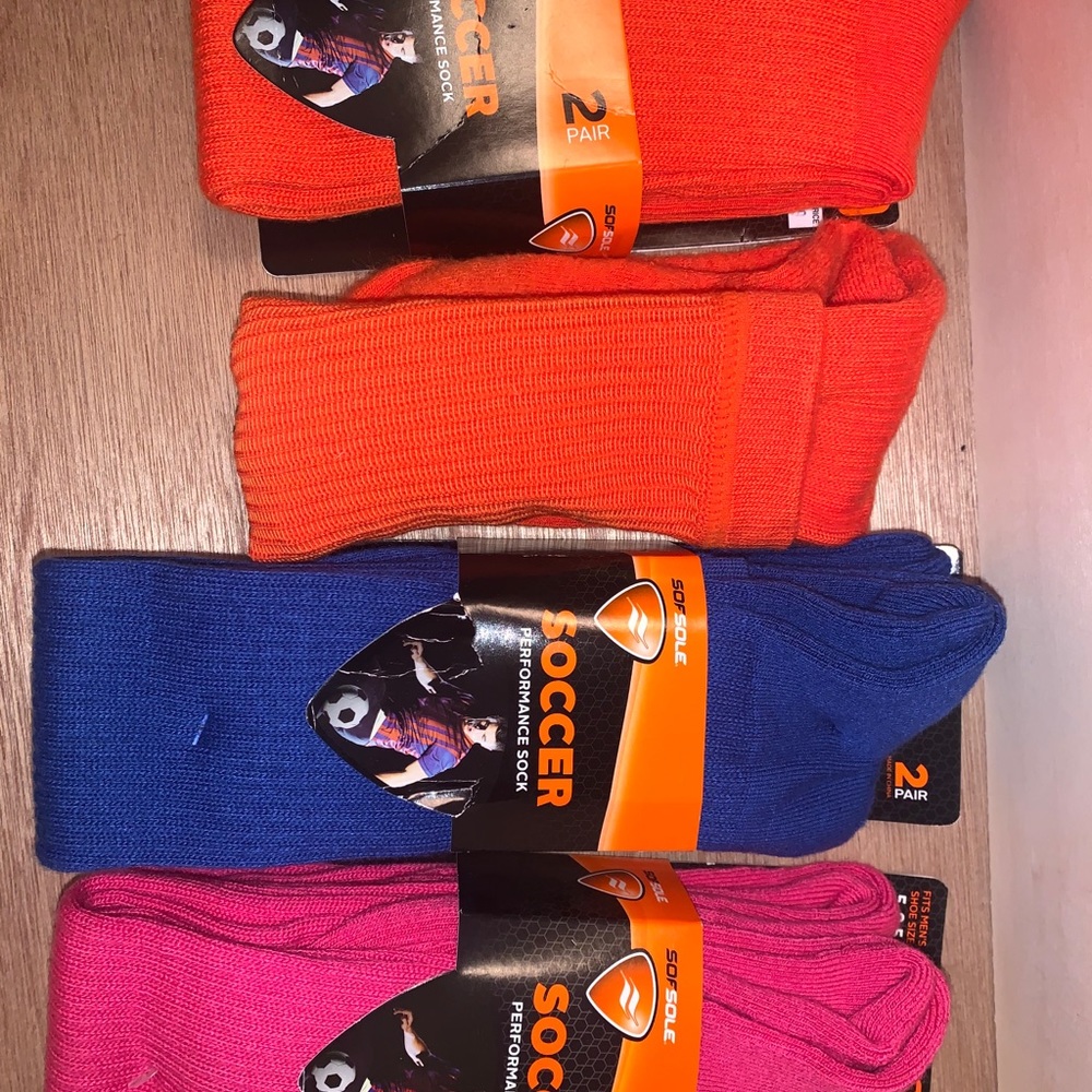 5 pair of NEW soccer socks and 1 used bonus pair